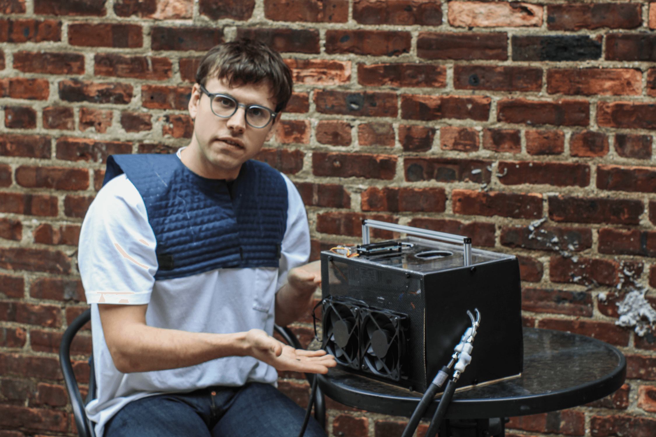 Image of Erik showing off the CS0 garment and hub