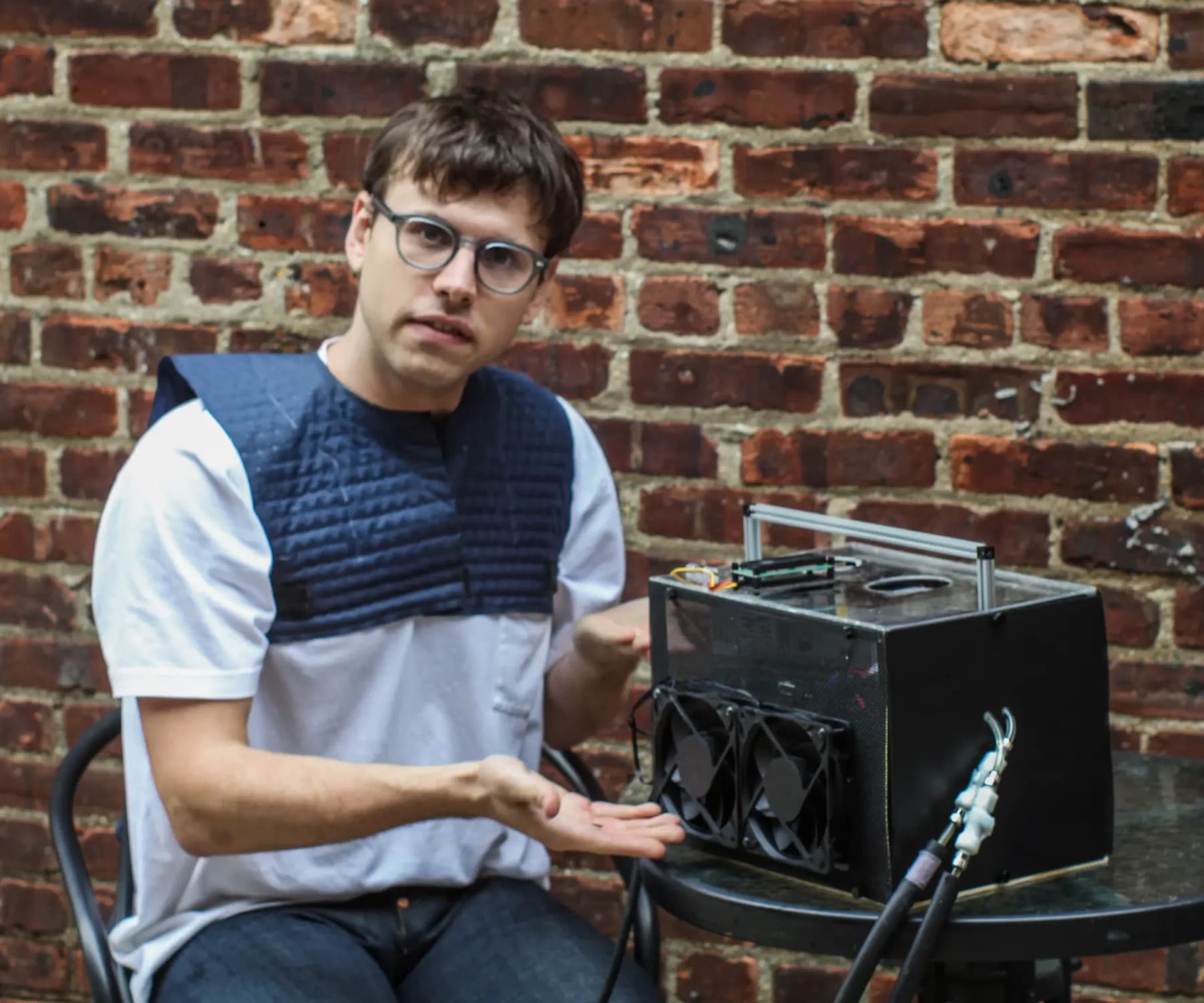 Image of Erik showing off the CS0 garment and hub